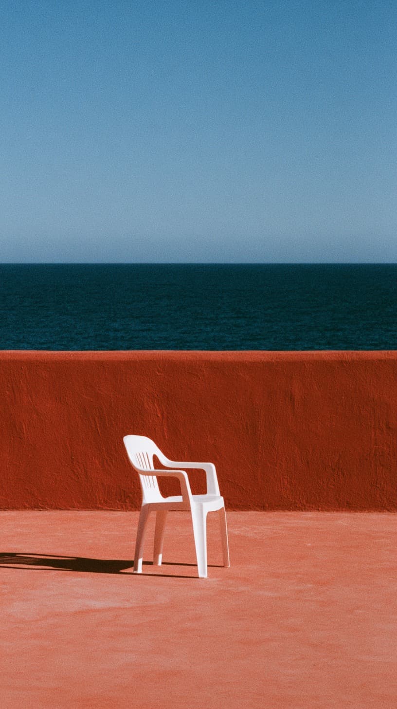 White Chair Facing the Sea: architecture, chair — AI-generated Architecture image made with Midjourney