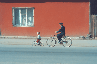 Father and Child on Bicycles: photorealistic, bicycle — AI-generated Photorealistic image made with Midjourney