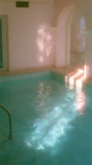 Quiet Indoor Pool: swimming pool, pastel — AI-generated Photorealistic image made with Midjourney
